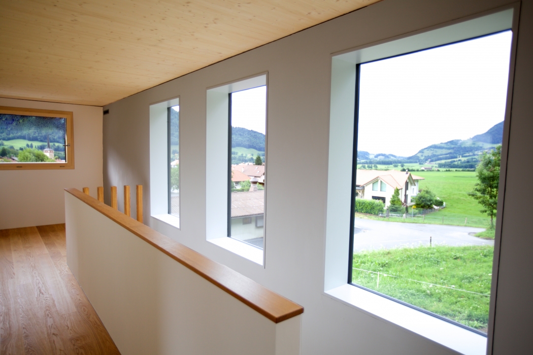construction maison construction ossature bois maison en bois label Minergie maison Minergie maison d’architecte maison écologique maison écolo maison éco architecture écolo architecture éco maison bois habitat sain architecture durable architecture contemporaine architecture moderne bureau architectes architecte Fribourg architecte Bulle architecte Romont maison Minergie