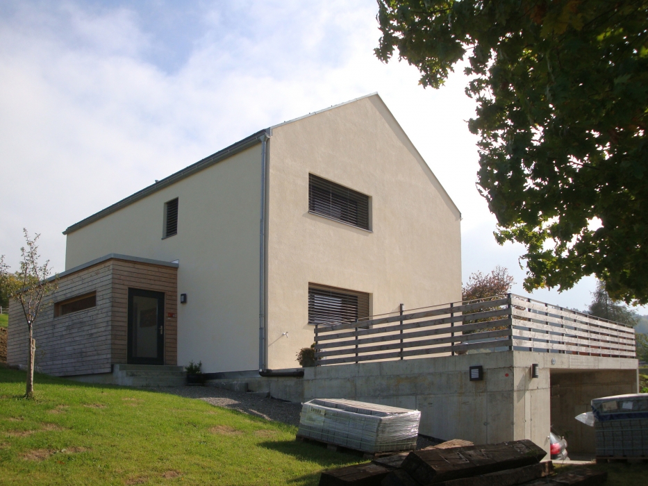 construction maison construction ossature bois maison en bois label Minergie maison Minergie maison d’architecte maison écologique maison écolo maison éco architecture écolo architecture éco maison bois habitat sain architecture durable architecture contemporaine architecture moderne bureau architectes architecte Fribourg architecte Bulle architecte Romont maison Minergie
