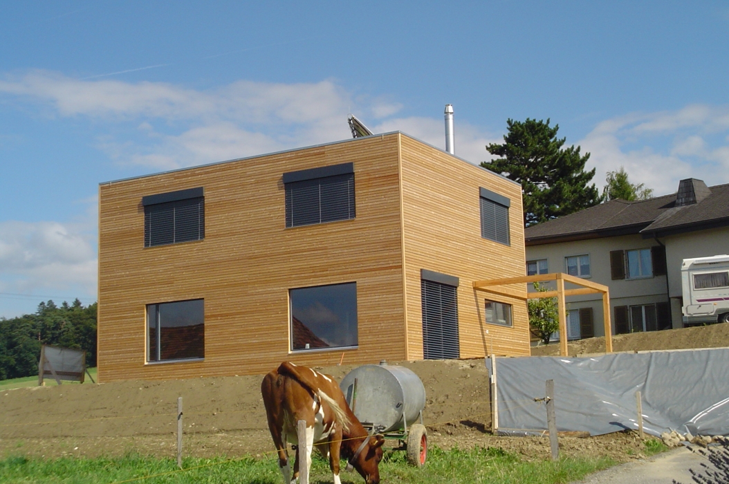 construction maison construction ossature bois maison en bois label Minergie maison Minergie maison d’architecte maison écologique maison écolo maison éco architecture écolo architecture éco maison bois habitat sain architecture durable architecture contemporaine architecture moderne bureau architectes architecte Fribourg architecte Bulle architecte Romont maison Minergie